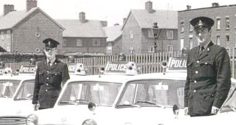 Roof-mounted POLICE boards and warning lamps on Liverpool police Minis